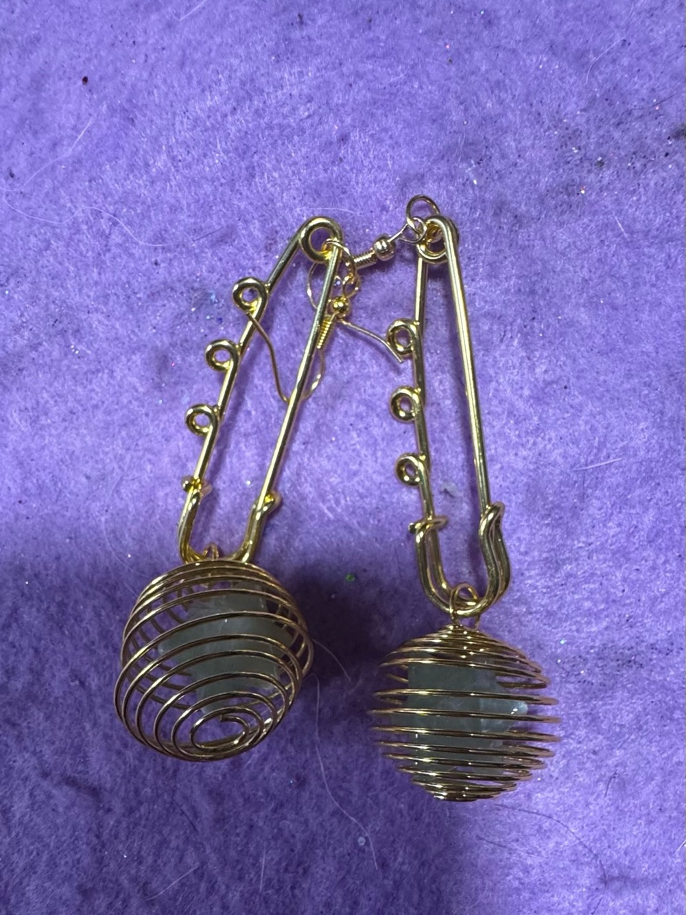 Golden safety pin Earrings with green aventurine spiked stone in golden cage